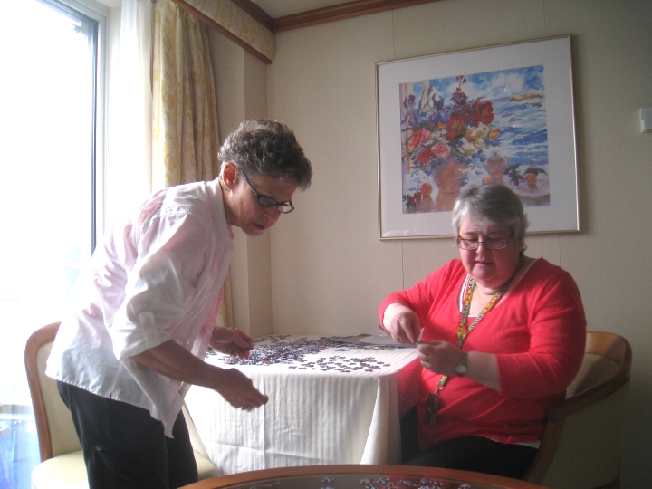 Heather and Mary working on a jigsaw puzzle