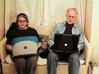 Tony and Heather, both with Mac laptops