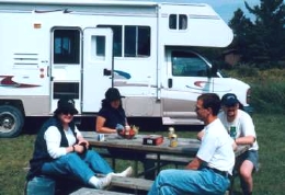 Campers beside motorhome