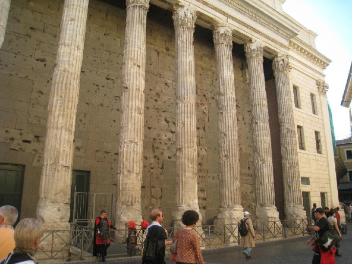 Temple of Hadrian, with gladiator
