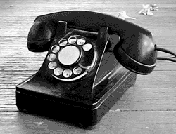 an antique rotary dial telephone